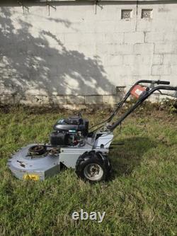 Rough Cut Lawn Mower. Compact, Pedestrian Mower, Self Propelled