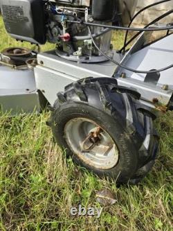 Rough Cut Lawn Mower. Compact, Pedestrian Mower, Self Propelled