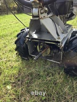 Rough Cut Lawn Mower. Compact, Pedestrian Mower, Self Propelled