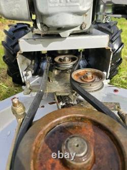 Rough Cut Lawn Mower. Compact, Pedestrian Mower, Self Propelled