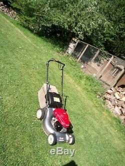 Self propelled honda petrol lawnmower. Bought and hardly used due to illness