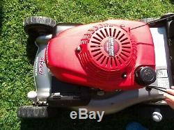 Self propelled honda petrol lawnmower. Bought and hardly used due to illness