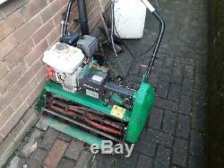 Self propelled petrol lawnmower used