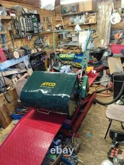 Vintage kick-start petrol Atco lawn mower. Restored and serviced