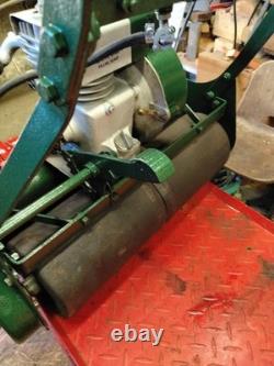 Vintage kick-start petrol Atco lawn mower. Restored and serviced